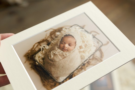 found in our custom Folio Box. - The folio box comes in different sizes, lots of colors, and pure gorgeousness! Choice of 5x7, 8x10 or 8x12 mats, sealed and holding your beautiful baby's image. Magnificent texture.