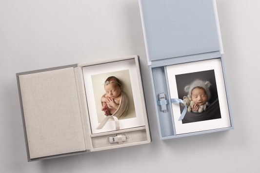 contain 10-20 matted prints. Several sizes available. - Opeining a folio box is like opening a treasure chest full of wonder and memories. Newborn babies are tiny for such a short peiriod of time. Within a few weeks they have changed so much! Cheeks get chubbier, baby fuzz turns to a head of hair, fuzzy shoulders turn smooth. Maybe we will capture a sleepy smile, or a big yawn, or some spitty baby bubbles on pouty lips! Eyelashes! Baby Toes! And seemingly impossible poses. Captured, turned into treasure.